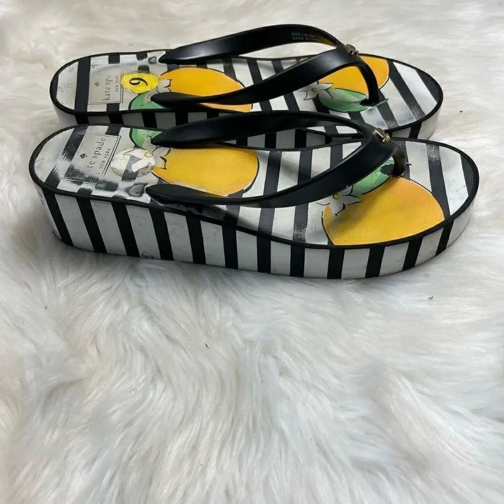 Kate Spade New York platform thong sandals with gold tone logo size 9M